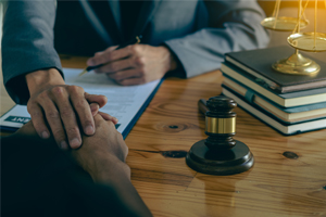 Attorney reviewing financial records in a Virginia embezzlement case.